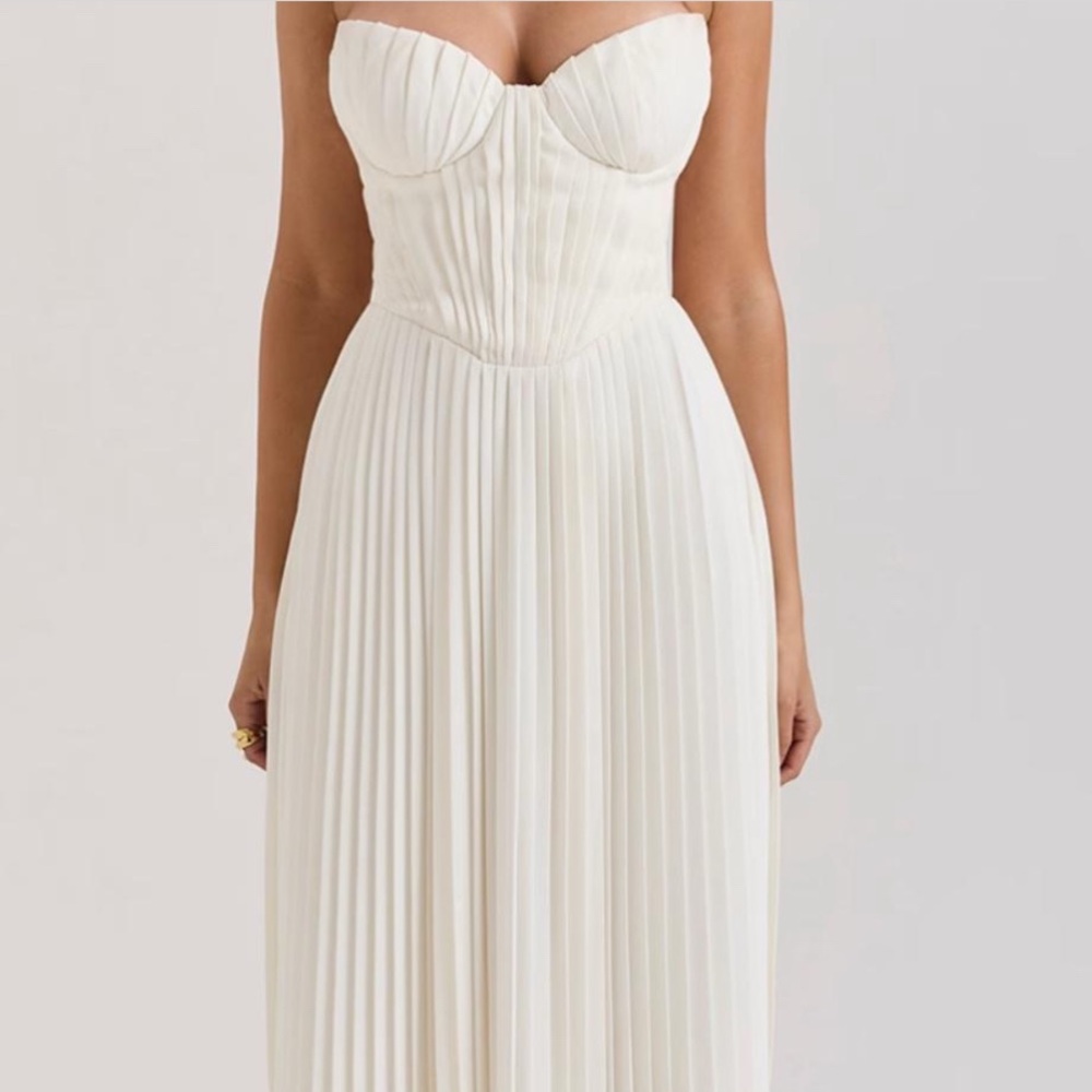 Brand new house of cb dress in size medium with larger cups